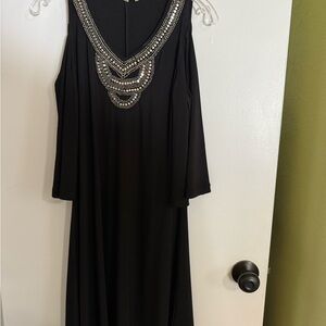 Elegant Black Dress with Embellished Neckline